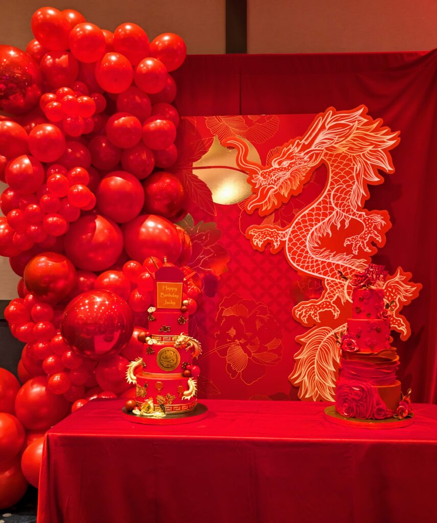 red balloon, red rose, red dragon cake backdrop