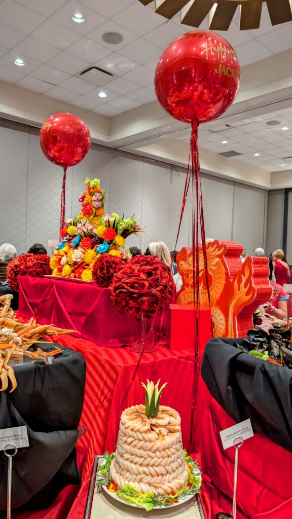 red arch backdrop with red dragono floor decal